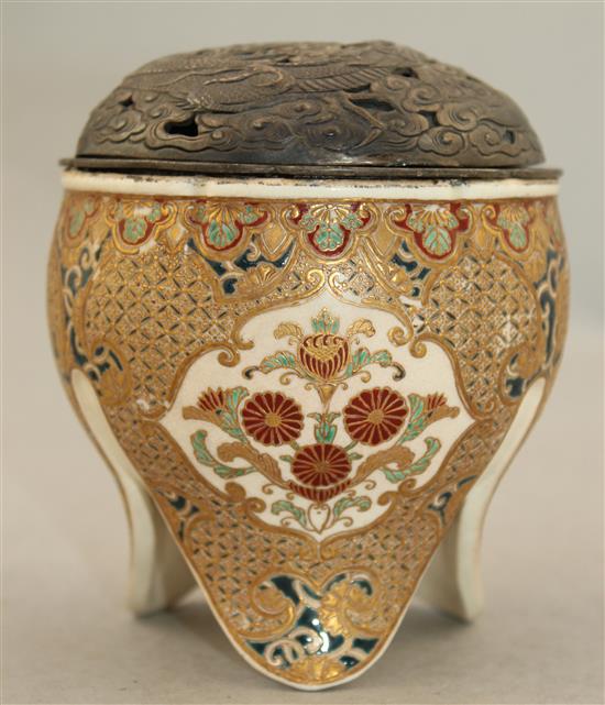 A Japanese Satsuma pottery tripod koro and a similar baluster vase, Meiji period, 13cm. (2)